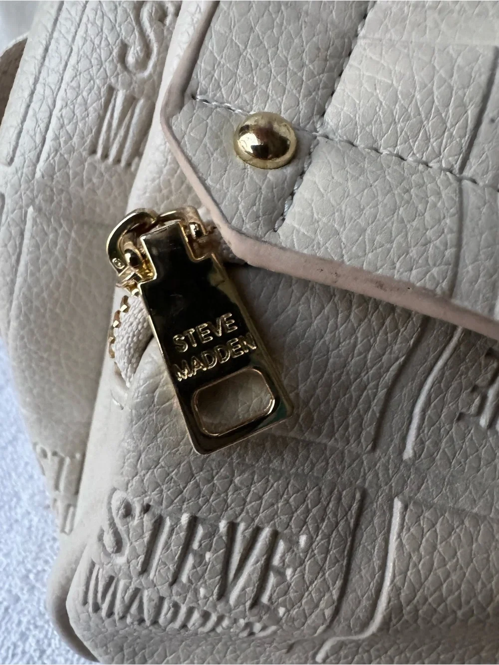 Steve Madden Cream Quilted Logo Backpack with Tassel